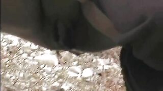 Two cheeky ladies poops in the field