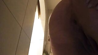 Mistress spread her ass cheeks in a dirty bathroom stall