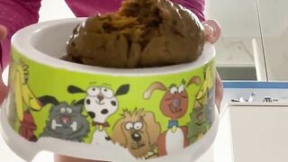 Filling the container with her poop