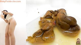 Amazing lovely Japanese milf pushing hot shit