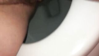 Closeup of hairy slut pooping