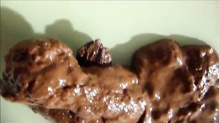 Nice view of a girl asshole while shitting