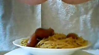 Adding the Poop Sauce on noodles