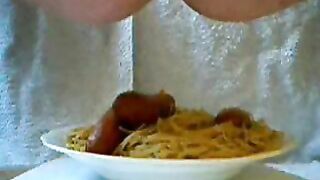 Adding the Poop Sauce on noodles