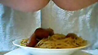 Adding the Poop Sauce on noodles