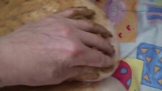 Smearing shit heavily on her chubby body