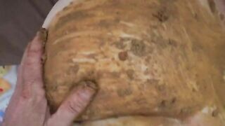 Smearing shit heavily on her chubby body