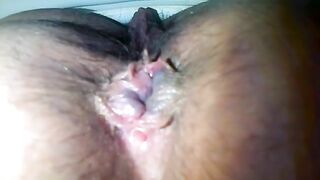 Close up of mature woman shitting