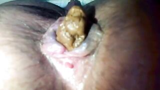 Close up of mature woman shitting