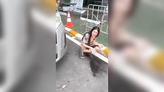 Crazy Asian pissing at the parking