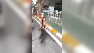 Crazy Asian pissing at the parking