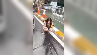 Crazy Asian pissing at the parking