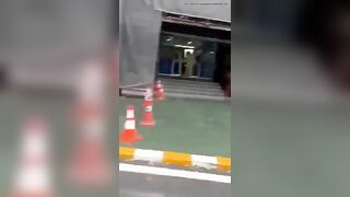 Crazy Asian pissing at the parking