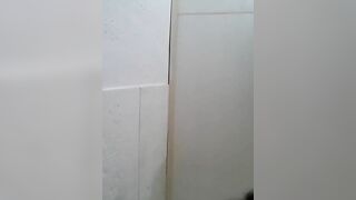 Cute Asian girl squats naked for shitting