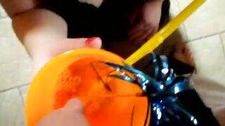 Drinking fresh piss juice from cup