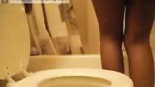 Ebony lovely lady poops in the toilet