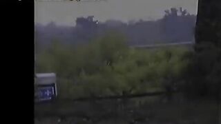 Elizabeth pissing on the road