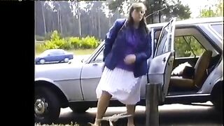 Elizabeth pissing on the road