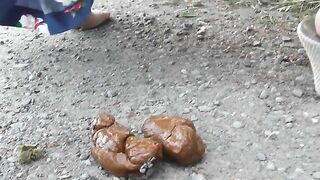 Hairy amateur lady poops nicely outdoor
