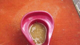 Girl shitting into potty