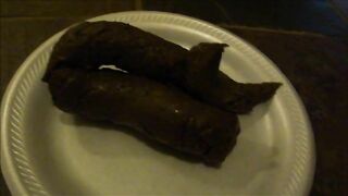 Huge stinky sausage on the plate