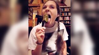 Lunatic babe eats a scatcicle