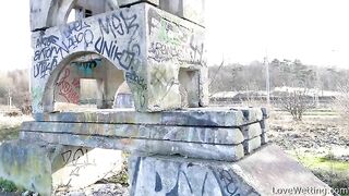 Mature in red dress pissing in the public