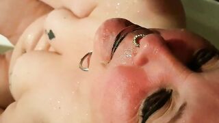 Girl tortures her own ass in the shower with anal hooks.