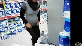 Pissing Japanese wife in the store