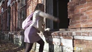 Sexy European shows off her ass while pissing nicely