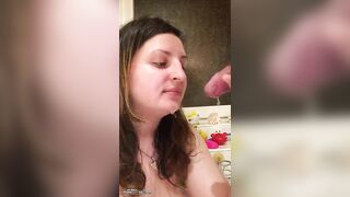 Sweet wife taking pee in her mouth