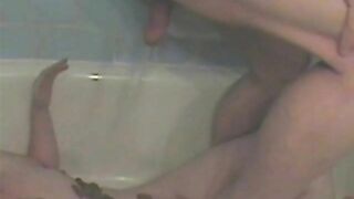 Shitting on 18 year old in the bathtub