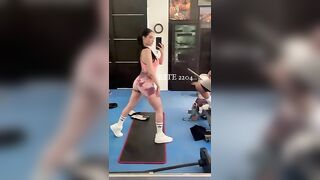 Girl flashes ass while riding a fitness machine