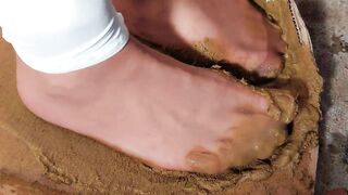 Very dirty brown pantyhose glued of dog scat