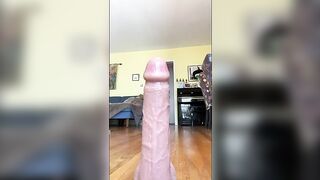 Girl licks shit off a fake penis like a lollipop