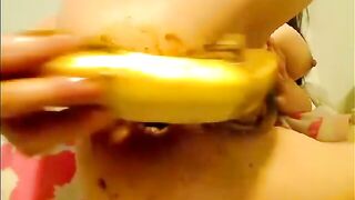 Slutty babe takes big dildo and banana in her booty