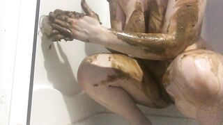 Big tits babe smearing shit on her sexy body