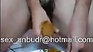 Hairy pussy milf smearing shit on the dildo