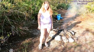 Mature lady with huge saggy tits pissing on the campfire