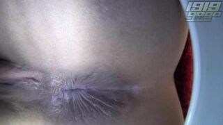 Young Chinese girl's extreme close up pee