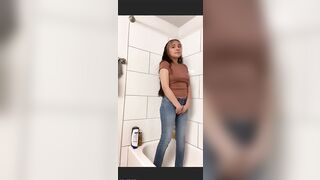 Cute Latina Peeing Her Blue Jeans