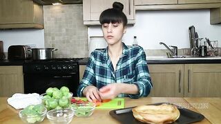 Cute teen girl making shit salad