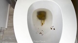 Messy dark shit in the toilet for you