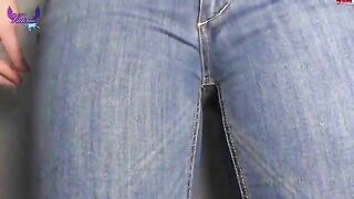 Good piss feels so great between her jeans