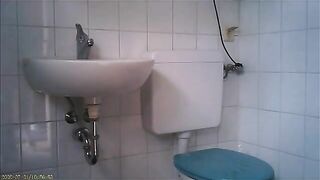 Granny on toilet shitting