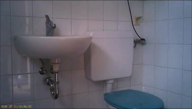 Granny on toilet shitting