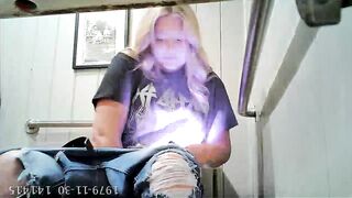 Hot young blond caught using toilet in the restaurant