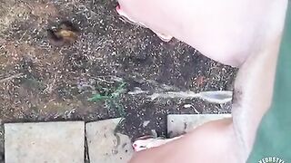Filming while pissing on the footpath