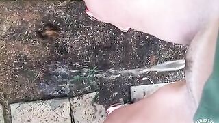 Filming while pissing on the footpath