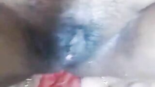 Indian Tamil aunty pissing while showing her pussy